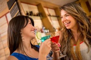 bigstock-Two-women-having-drinks-at-the-45150049