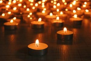 bigstock-Burning-candles-on-dark-backgr-46735477