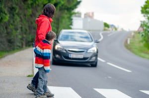 bigstock-Car-stopped-for-pedestrian-42758428