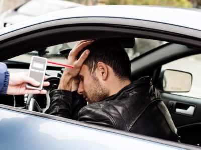 this is a photo of a man who has failed his car breathalyzer test